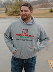 Man wearing a Merschman Seeds grey sweatshirt